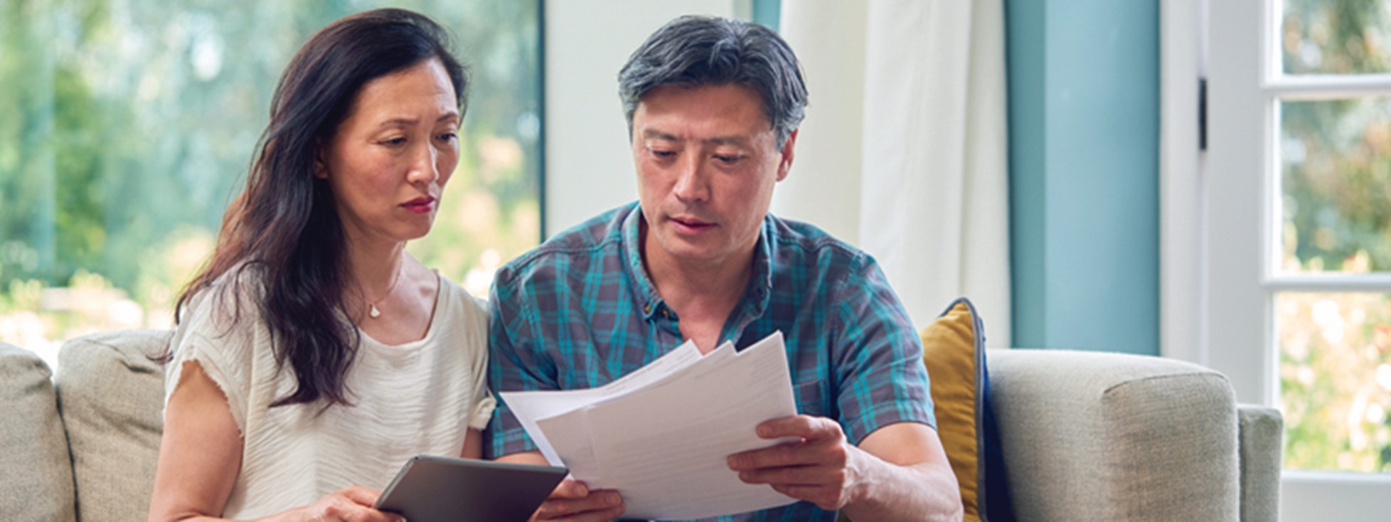 Couple looking at documents together