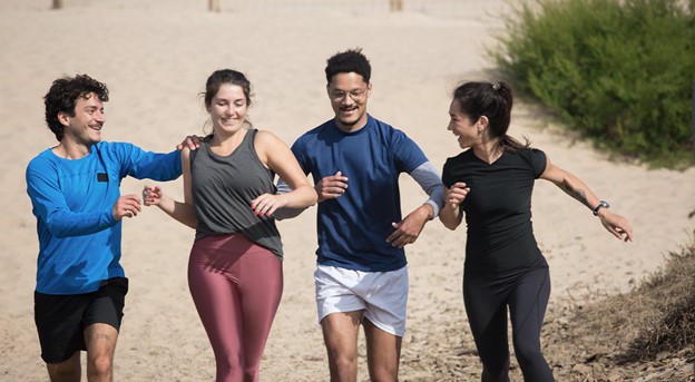 a group of friends walking together laughing