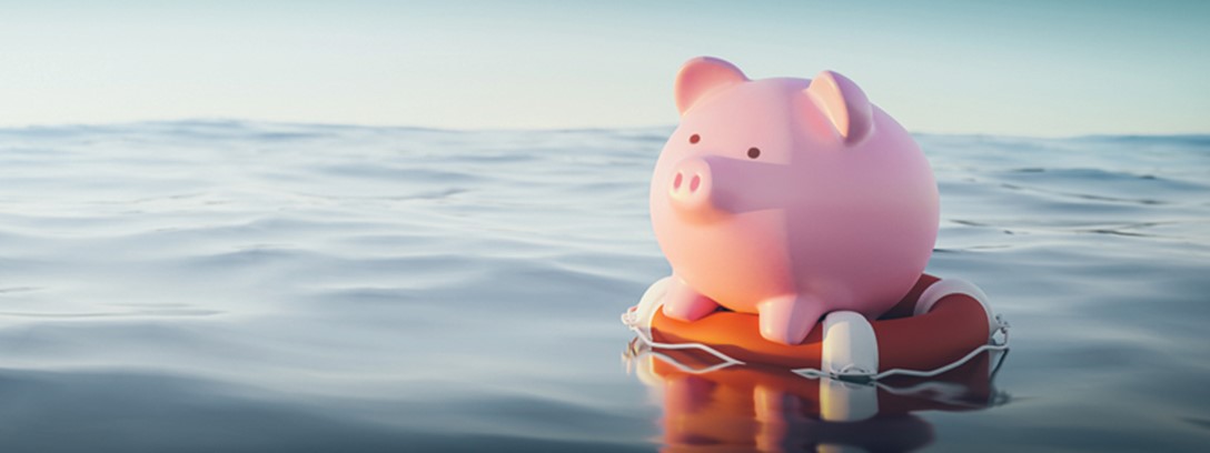 piggy bank on the beach