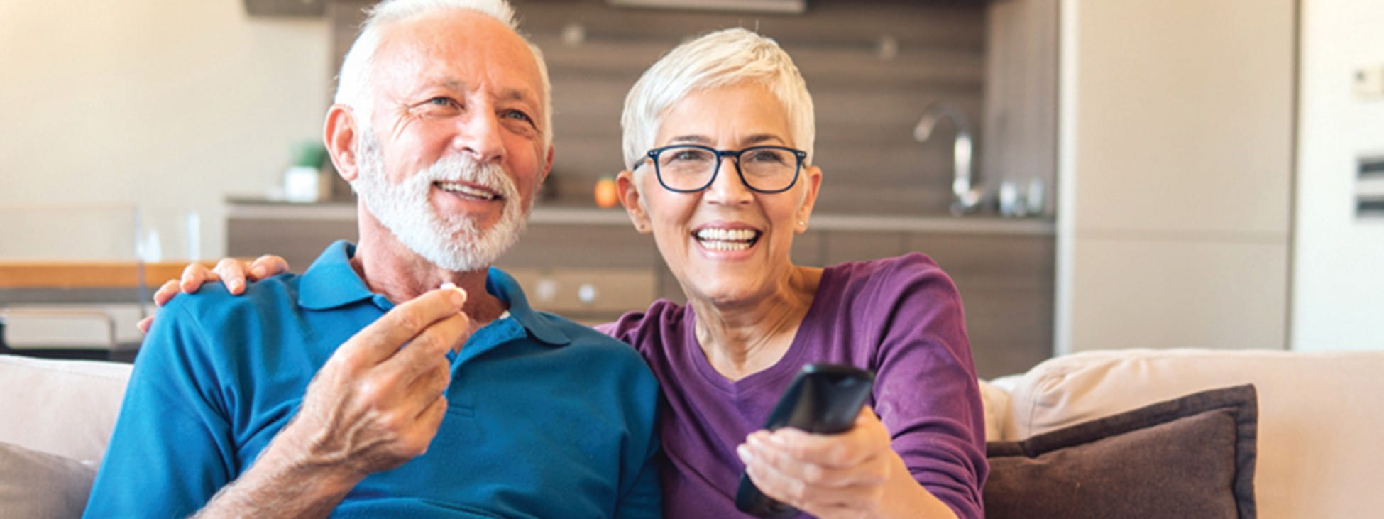 Older couple watching TV